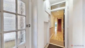 front door to lower hallway- click for photo gallery